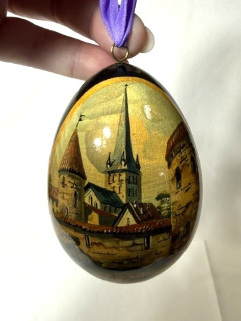 Vintage hand-painted, signed Russian church motif wooden Christmas ornament.